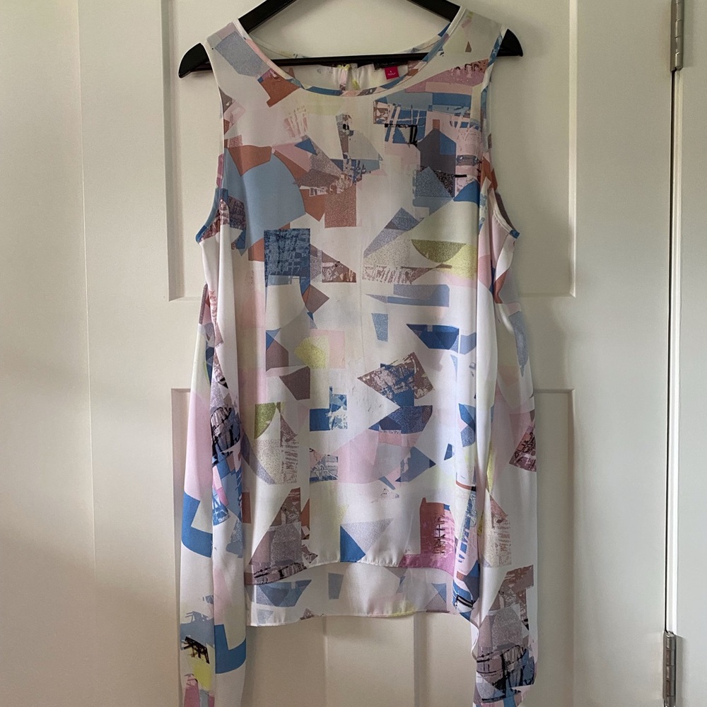 Asymmetrical sleeveless top